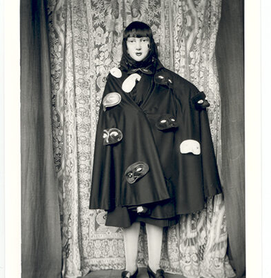 Self portrait (in robe with masks attached) © Claude Cahun. Courtesy of the Jersey Heritage Collections