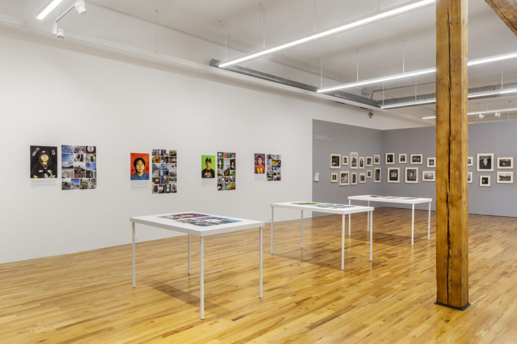 Installation image containing photographs and written texts from the series Daily Life and Dreams in the Pandemic: A Project with the Centro Romero Youth Program (2020–2021) by Wendy Ewald