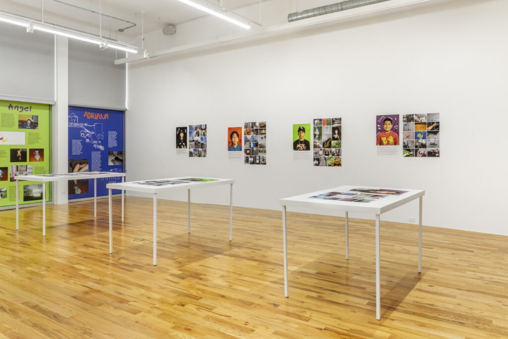 Installation image containing photographs and written texts from the series Daily Life and Dreams in the Pandemic: A Project with the Centro Romero Youth Program (2020–2021) by Wendy Ewald