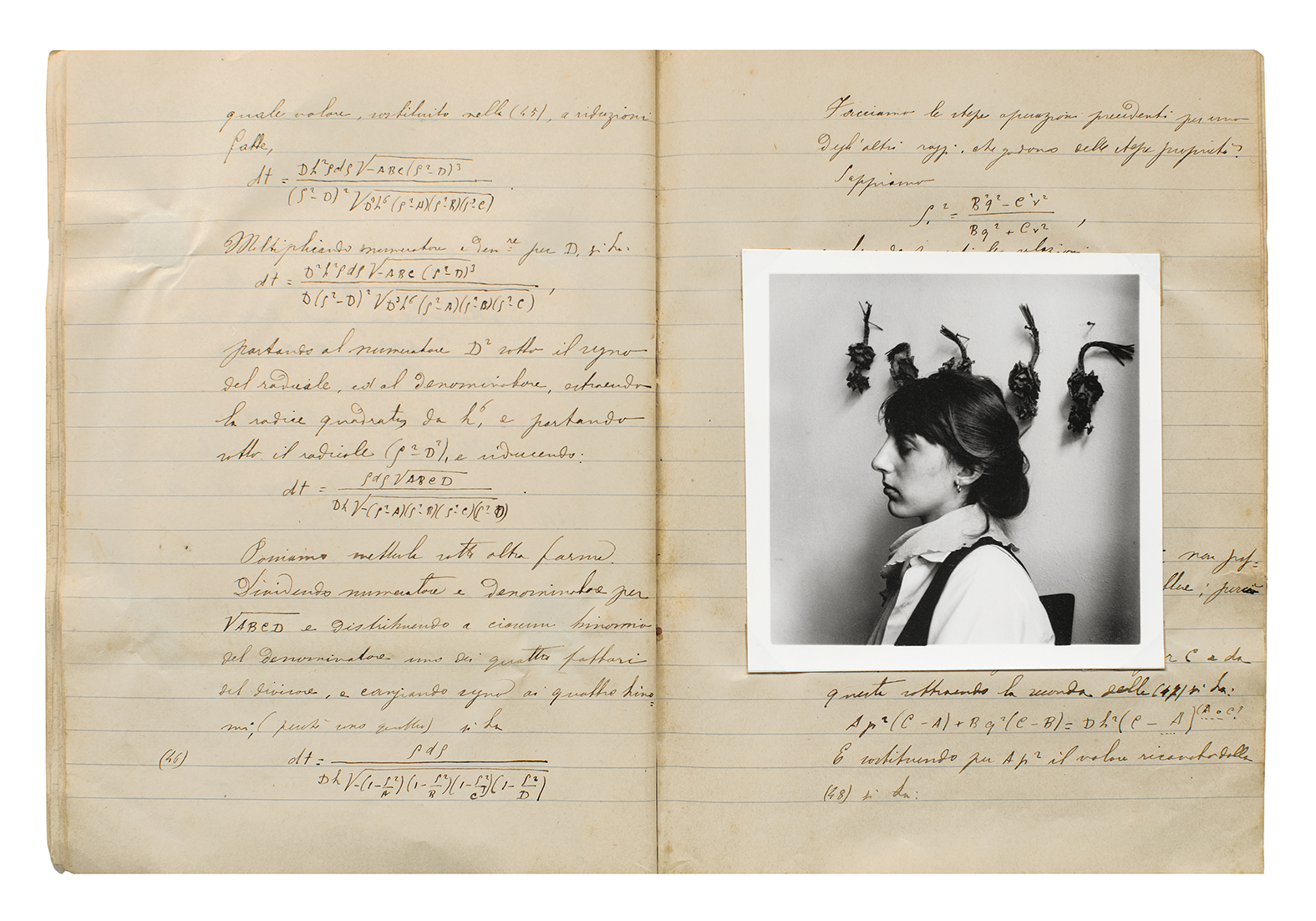 Double page spread of a lined notebook. On the right side page is a square, black and white photograph of a woman in profile, eyes closed, against a display of pinned up, dried flowers.